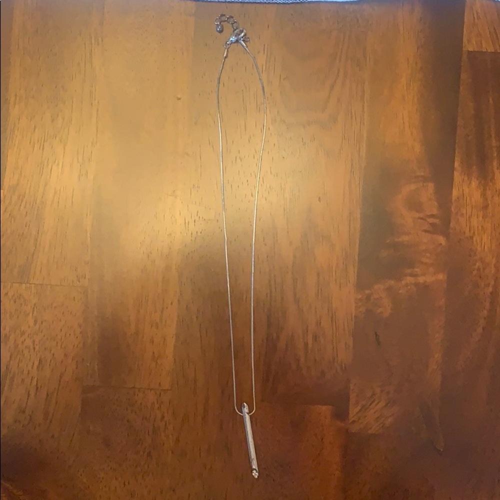 Silver necklace with “diamonds” at the end